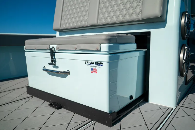 Slide: The Image of 2026 Front Runner 39 CC boat with Frigid Rigid cooler and cushioned seat. - 13