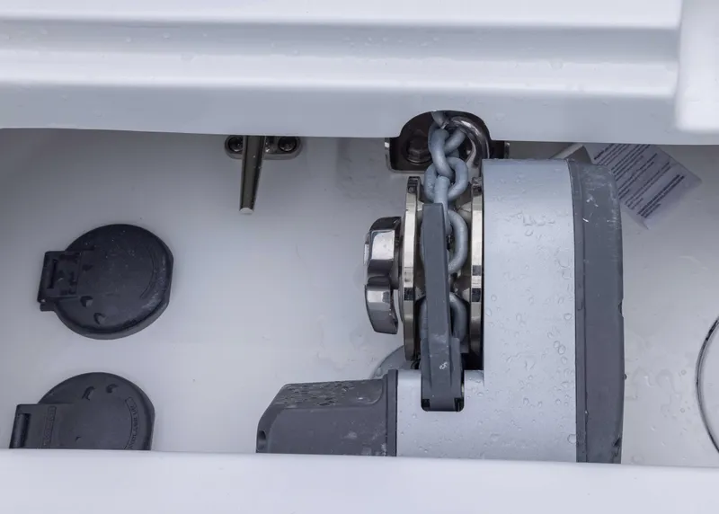 Slide: The Image of Anchor chain mechanism on 2026 Sea Hunt Ultra 245 SE boat. - 5