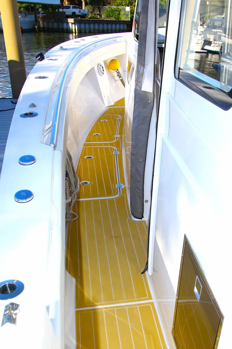 Slide: The Image of Century NAV4100 CC-H (Twins) 2025 boat with sleek deck design and modern features. - 11