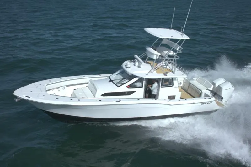 Slide: The Image of Century NAV4100 CC-H (Twins) 2025 boat cruising on open water. - 2