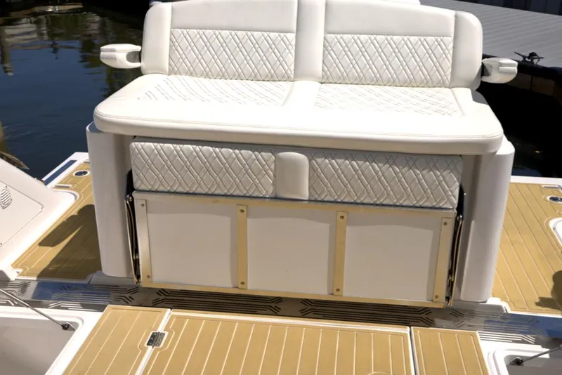 Slide: The Image of Luxury seating on 2025 Century NAV4100 CC-H boat, featuring elegant white upholstery. - 29