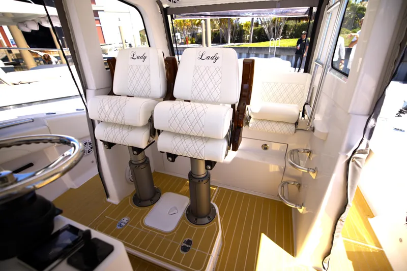Slide: The Image of Luxurious interior of 2025 Century NAV4100 CC-H boat with elegant seating and modern design. - 34