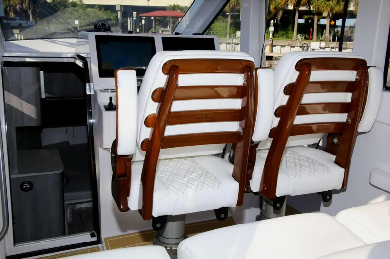Slide: The Image of Interior of 2025 Century NAV4100 CC-H boat with twin captain chairs. - 35