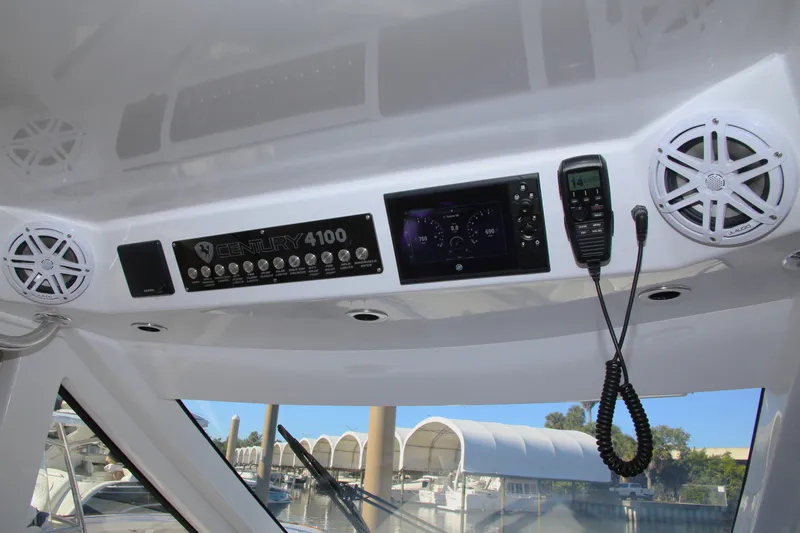 Slide: The Image of Control panel of 2025 Century NAV4100 CC-H boat with speakers and radio. - 39