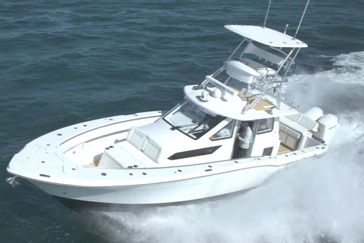 Slide: The Image of 2025 Century NAV4100 CC-H boat cruising on open water. - 4