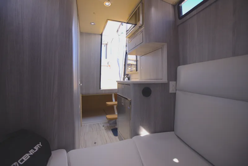 Slide: The Image of Modern interior of 2025 Century NAV4100 CC-H camper with sleek design and compact layout. - 48