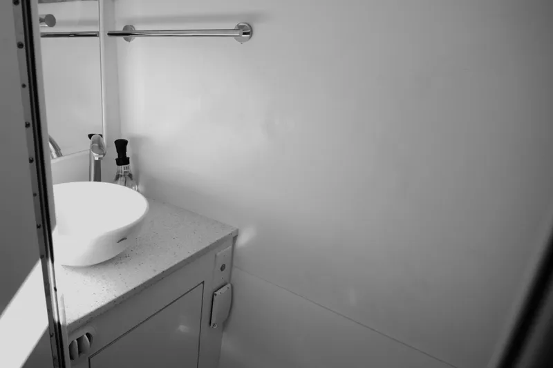 Slide: The Image of Modern bathroom in Century NAV4100 CC-H (Twins) 2025, featuring sleek sink and minimalist design. - 49