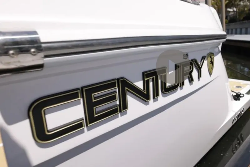 Slide: The Image of 2025 Century NAV4100 CC-H boat, close-up of logo on white hull. - 5