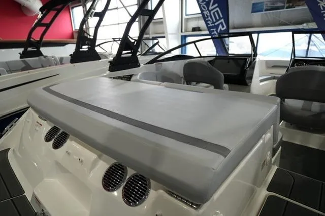 Slide: The Image of 2025 Bayliner V20i boat interior with sleek seating and modern design features. - 12