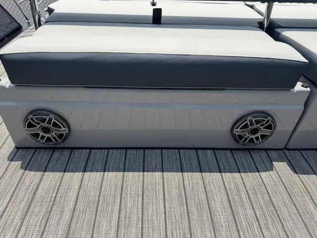 Slide: The Image of 2025 Harris Grand Mariner 250 boat seating with integrated speakers on deck. - 10