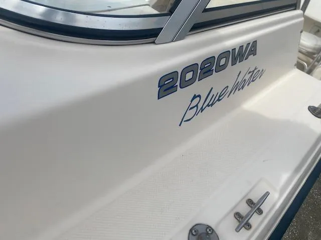 Slide: The Image of Key West 2020 Walkaround boat, model year 2003, with "Blue Water" branding. - 12