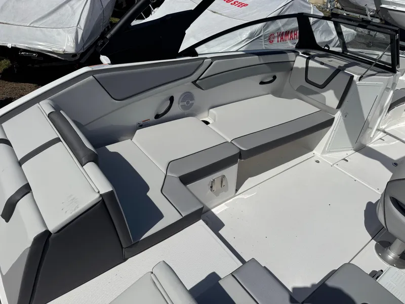 Slide: The Image of 2025 Yamaha Boats AR220 interior with sleek seating and modern design. - 4