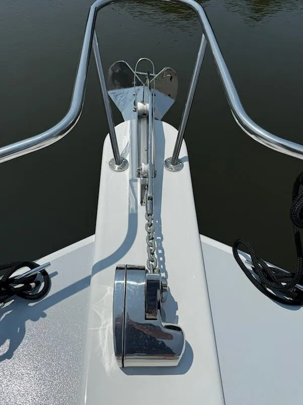 Slide: The Image of Bow of 2004 Mabry 40 boat with anchor and chain mechanism. - 12