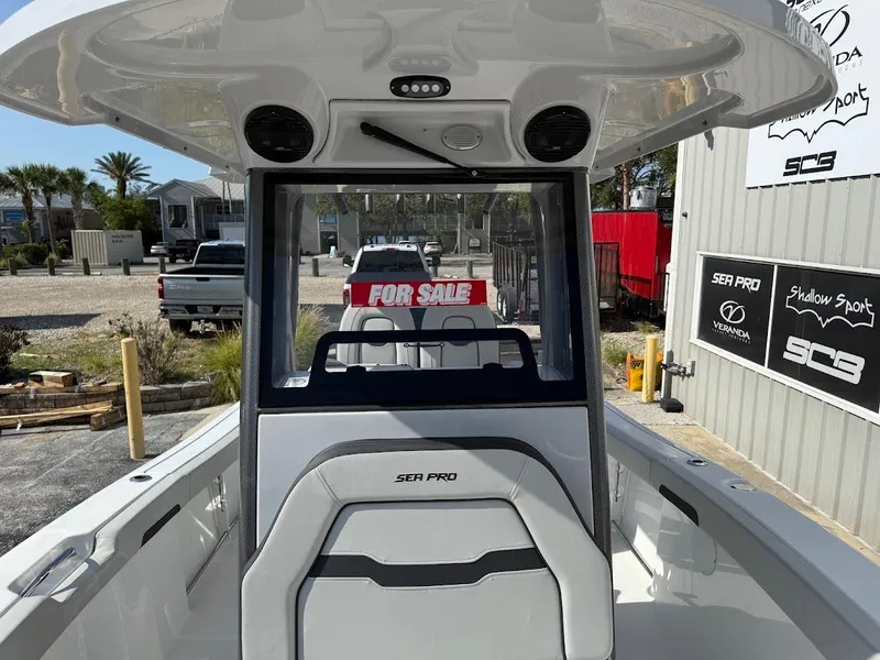 Slide: The Image of 2025 Sea Pro 242 Center Console boat for sale, displayed outdoors. - 12