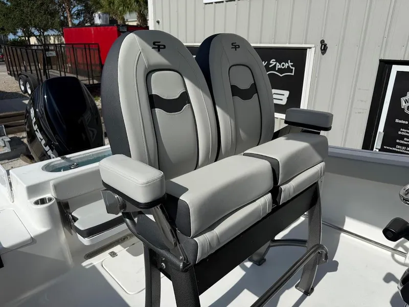 Slide: The Image of 2025 Sea Pro 242 Center Console boat seats, featuring sleek gray and black design. - 13