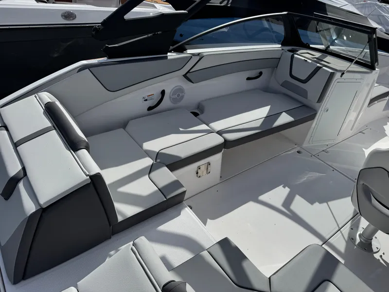 Slide: The Image of 2025 Yamaha Boats AR220 interior with sleek seating and modern design. - 5