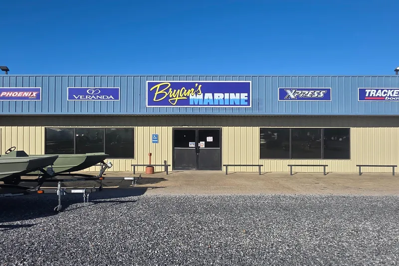 Slide: The Image of Exterior of Bryan's Marine store with boat brands signage, featuring Tracker Pro Team 175, 2025 model. - 10