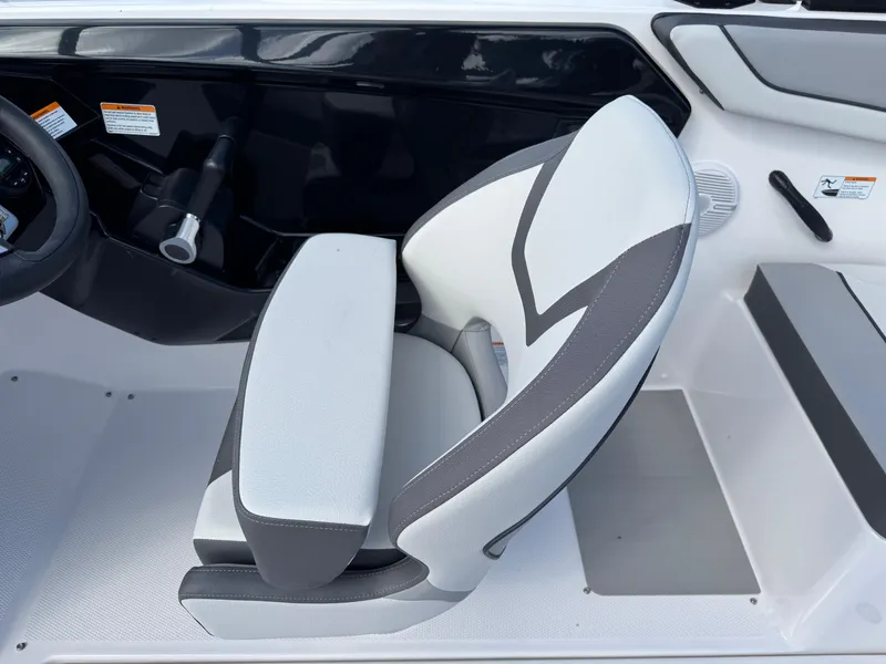 Slide: The Image of 2025 Yamaha Boats AR220 cockpit seat with modern design and comfortable upholstery. - 19