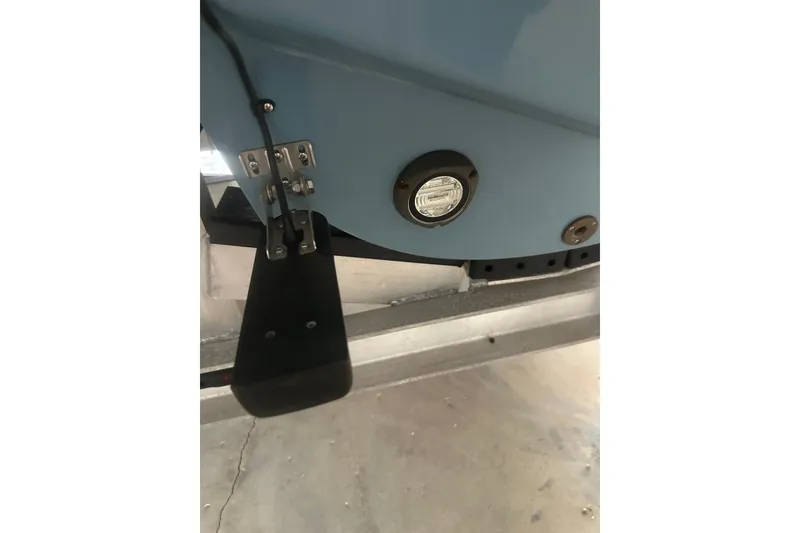 Slide: The Image of Close-up of a 2021 Sea Cat 260 boat's hull with a mounted light and bracket. - 14