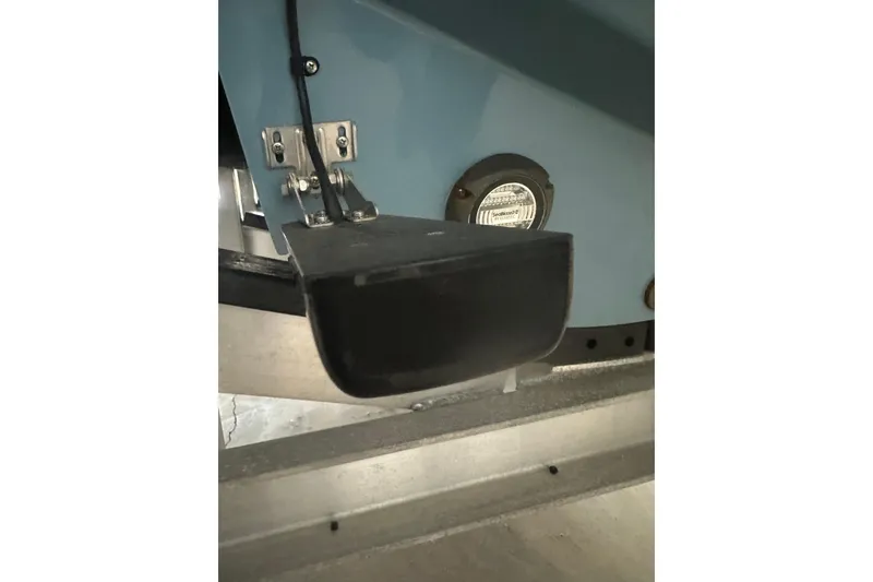 Slide: The Image of Close-up of a 2021 Sea Cat 260 boat component, featuring a mounted bracket and light. - 16