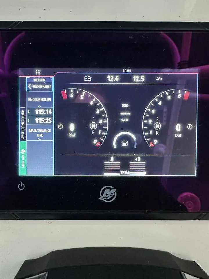 Slide: The Image of Digital dashboard display of a 2021 Sea Cat 260 boat showing engine metrics and navigation data. - 6