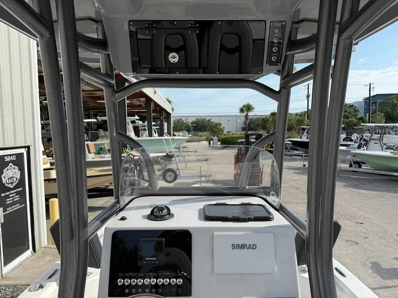 Slide: The Image of Interior view of 2025 Sea Pro 230 Bay boat with Simrad navigation system. - 10
