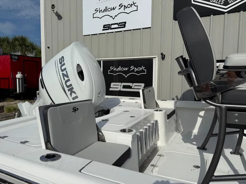 Slide: The Image of 2025 Sea Pro 230 Bay boat with Suzuki engine, featuring sleek seating and modern design. - 5