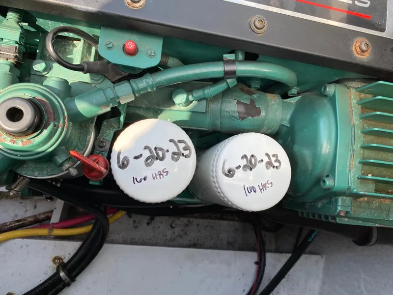 Slide: The Image of Engine components of a 2008 Landing School Arundel 27, with filters dated 6-20-23. - 28