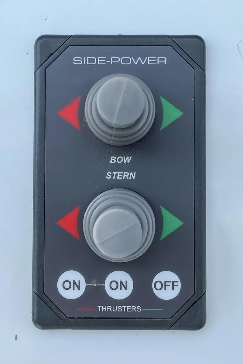 Slide: The Image of Side-Power thruster control panel on 1990 Hatteras 58 Sportfish boat. - 14