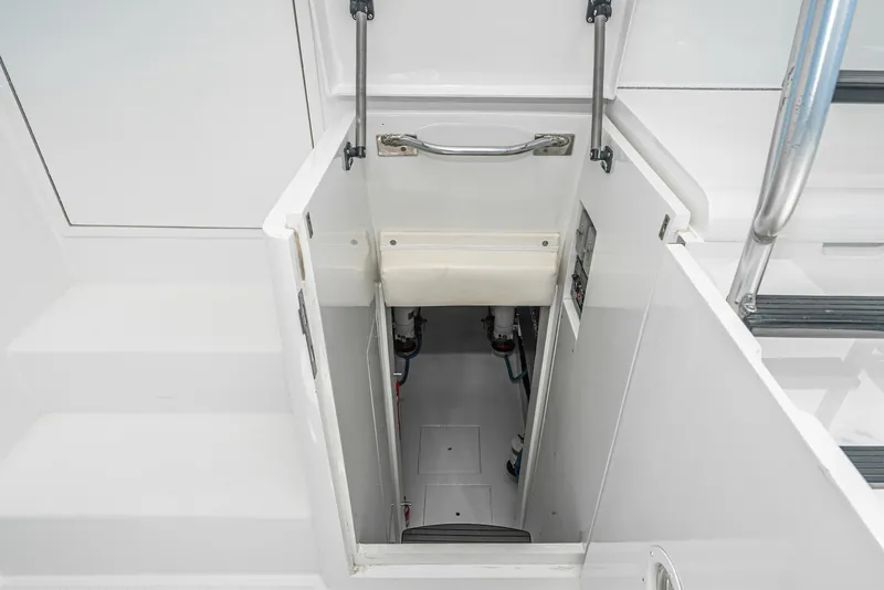 Slide: The Image of Engine room access hatch on 1990 Hatteras 58 Sportfish yacht. - 20