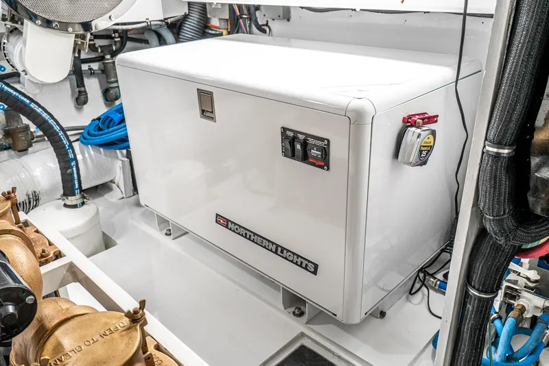 Slide: The Image of Engine room of 1990 Hatteras 58 Sportfish with Northern Lights generator. - 39