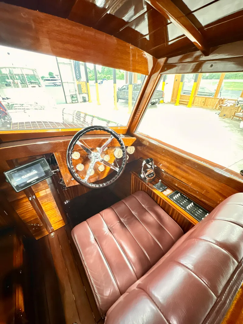 Slide: The Image of Luxurious 2015 Van Dam 35 boat interior with wooden finish and leather seating. - 13