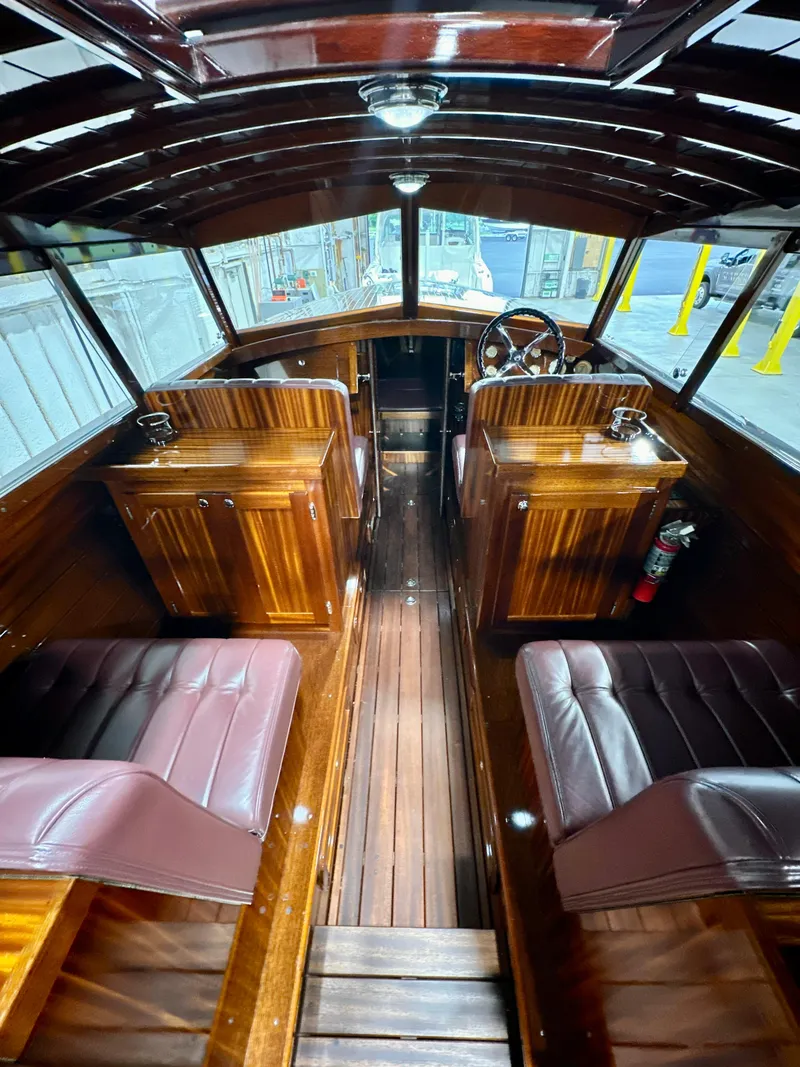 Slide: The Image of Luxurious 2015 Van Dam 35 boat interior with polished wood and leather seating. - 9