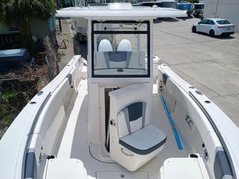 Slide: The Image of 2025 Robalo R270 Center Console boat with spacious deck and seating. - 36