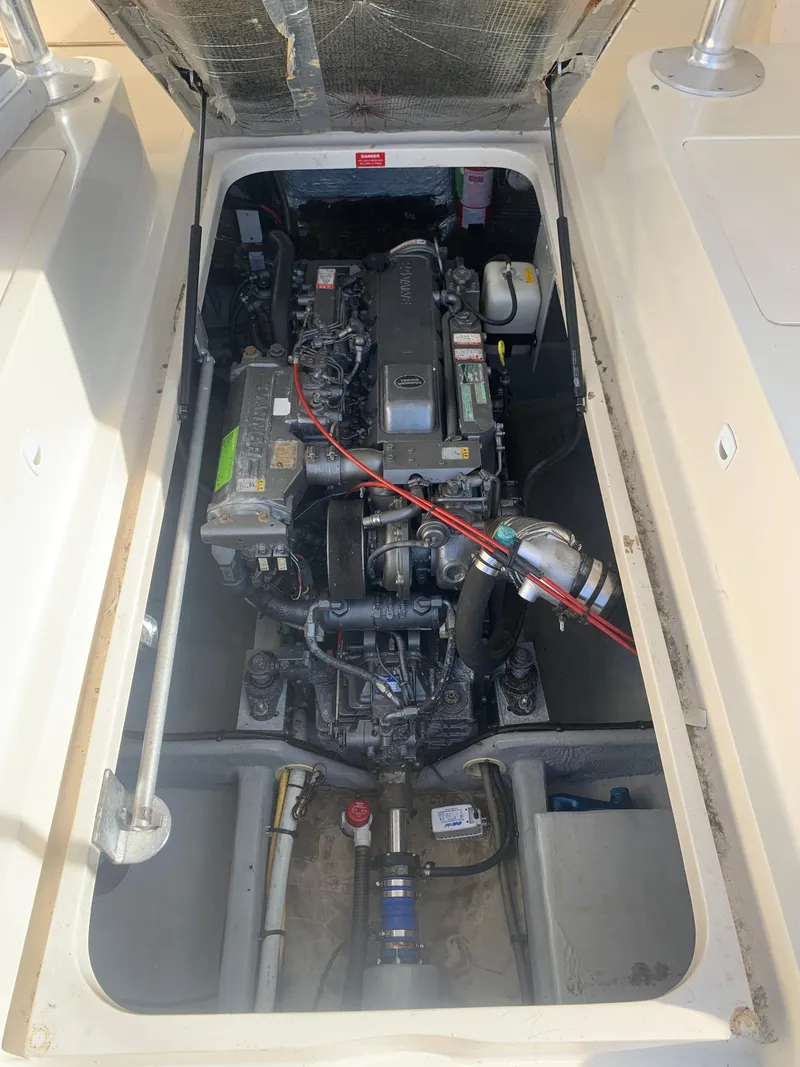 Slide: The Image of Engine compartment of a 2004 Mainship Pilot 30-II Sedan boat. - 12