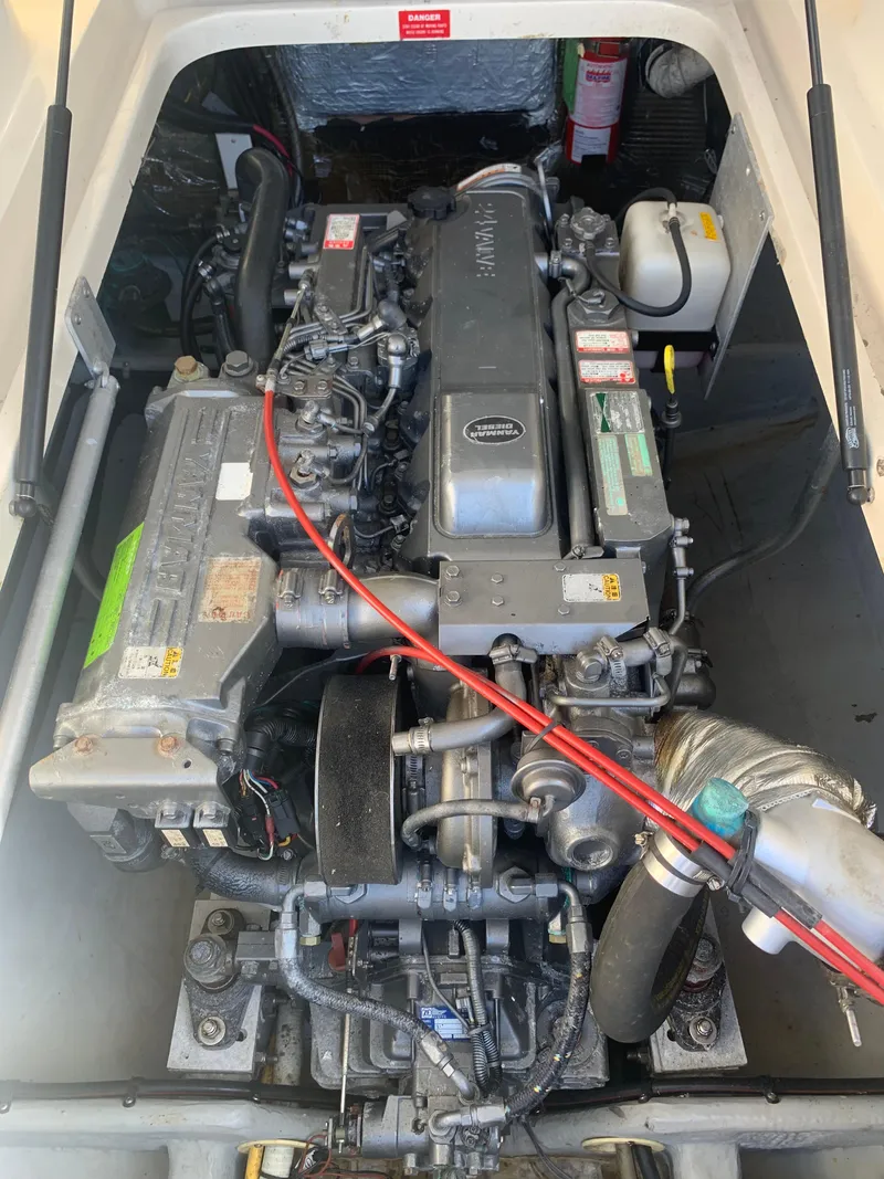 Slide: The Image of Engine compartment of a 2004 Mainship Pilot 30-II Sedan boat. - 13