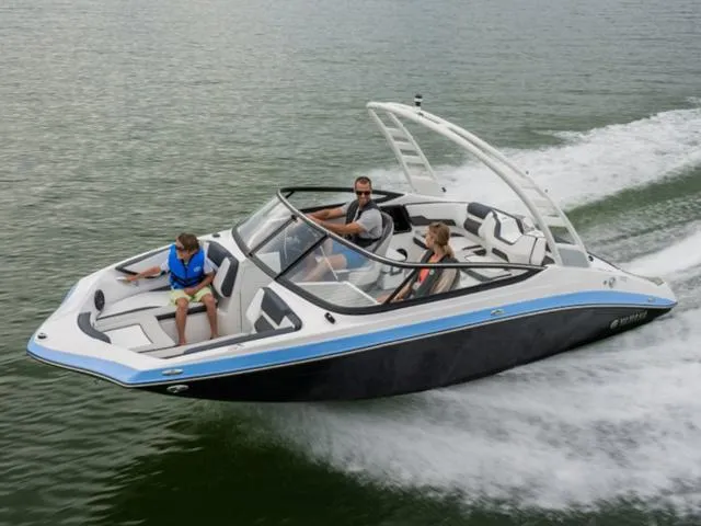Slide: The Image of 2025 Yamaha Boats AR195 speeding on water with passengers enjoying the ride. - 6
