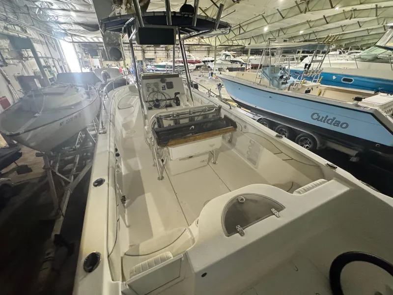 Slide: The Image of 2012 Carolina Skiff Sea Chaser 2400 Offshore boat in indoor storage facility. - 3