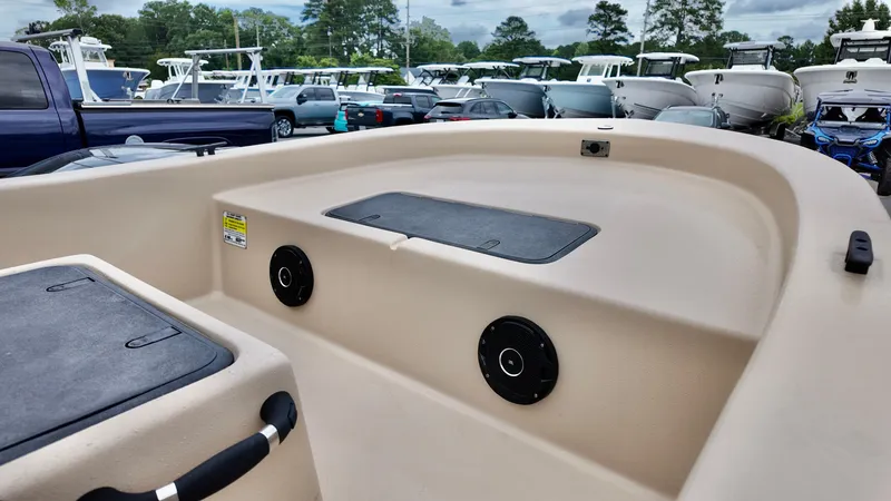 Slide: The Image of 2025 Carolina Skiff E18 JVX Swamp Edition boat interior with storage compartments. - 7