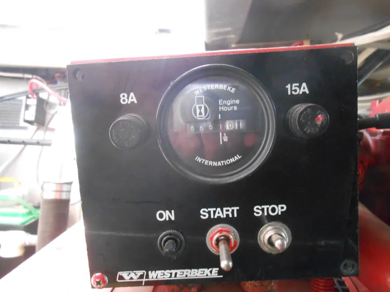 Slide: The Image of Control panel of a 1994 Stardust Cruisers houseboat with Westerbeke engine hour meter. - 31