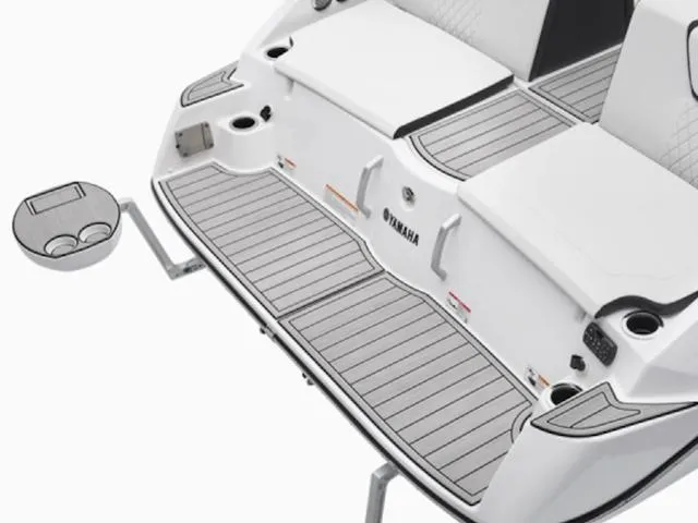 Slide: The Image of 2025 Yamaha Boats 222S swim platform with seating and cup holders, featuring sleek design. - 28