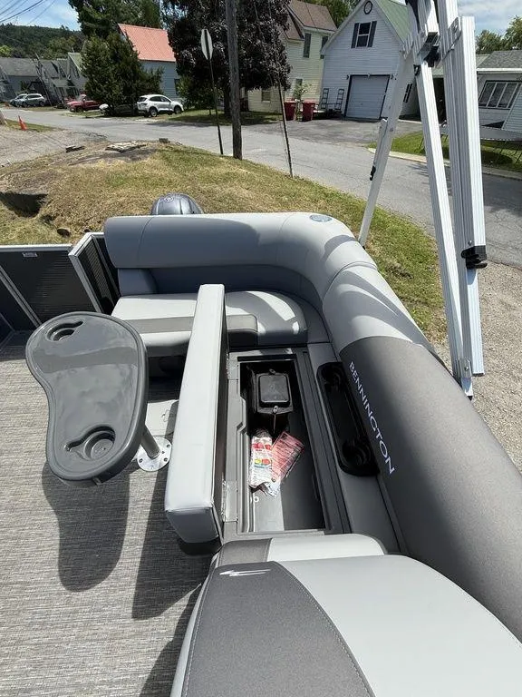 Slide: The Image of 2025 Bennington S L-Bench 18SVL pontoon boat interior with storage and seating. - 15