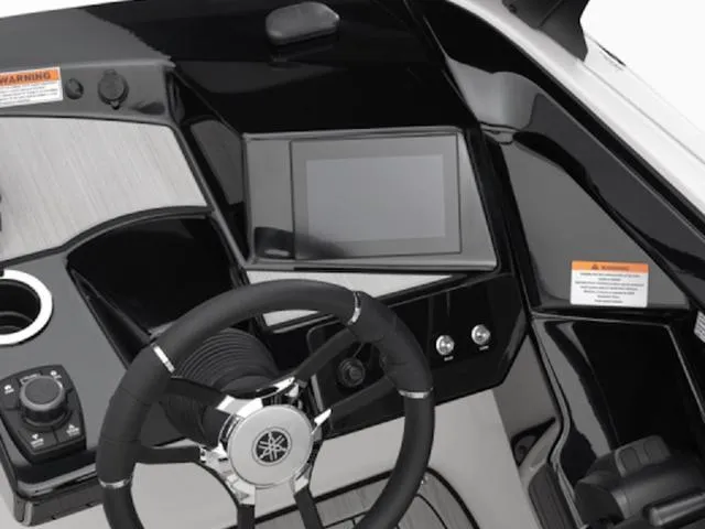 Slide: The Image of 2025 Yamaha Boats 222S dashboard with touchscreen, steering wheel, and control panel. - 25