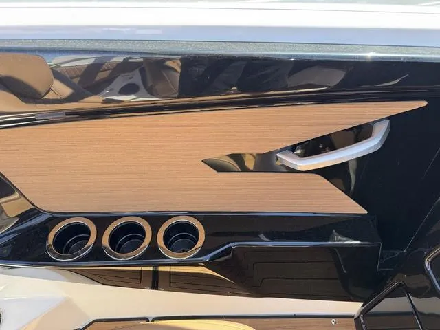 Slide: The Image of Interior detail of 2025 Yamaha Boats 222SD, featuring sleek design and modern accents. - 13