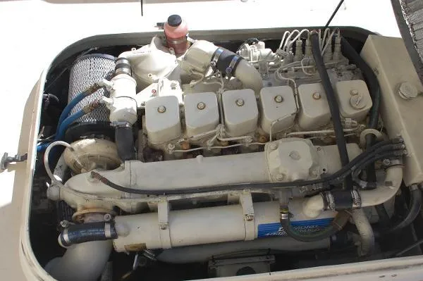 Slide: The Image of Engine of a 1997 Albin 28 Tournament boat, showcasing detailed components and layout. - 16