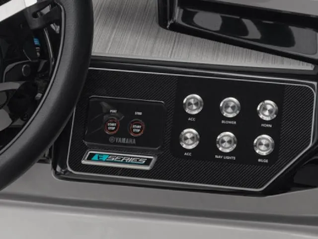 Slide: The Image of Control panel of 2025 Yamaha Boats 222SD, featuring buttons and steering wheel. - 39