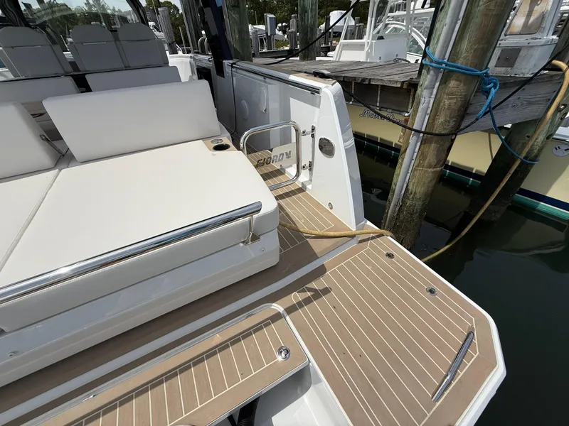 Slide: The Image of 2025 Fjord 39 XP yacht with sleek deck design and comfortable seating. - 14