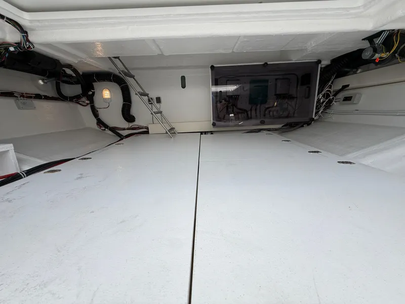 Slide: The Image of Engine room of 2025 Fjord 39 XP yacht, showcasing clean layout and wiring. - 18