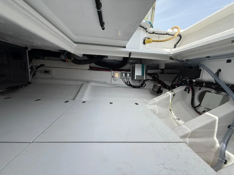 Slide: The Image of Engine compartment of 2025 Fjord 39 XP boat, showcasing clean layout and modern equipment. - 20