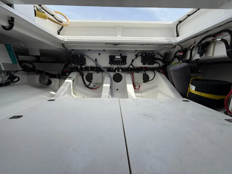 Slide: The Image of Engine compartment of 2025 Fjord 39 XP boat, showcasing wiring and components. - 21